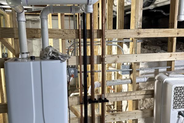 Tankless water heater maintenance and descaling in Elgin IL - Fox Valley Plumbing